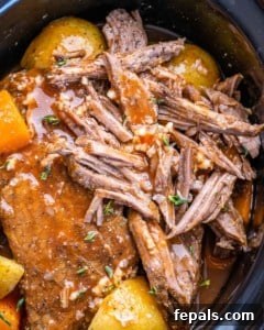 close up pot roast with carrots and potatoes
