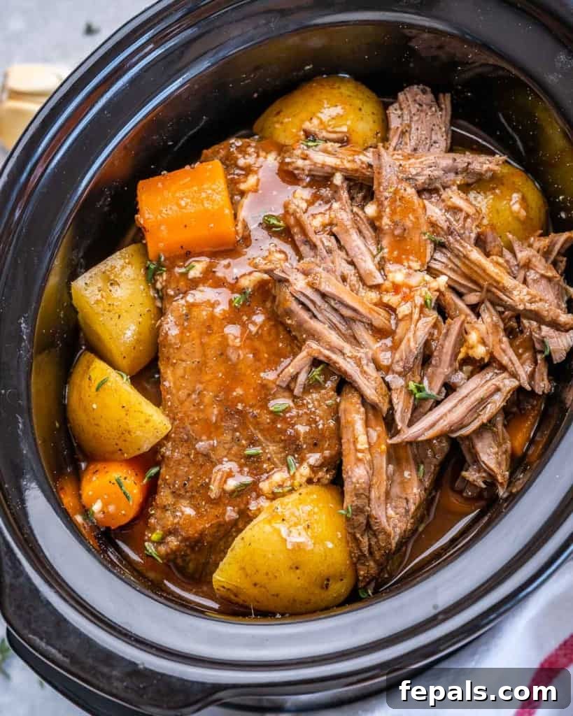 top view of cooked roast in slow cooker 