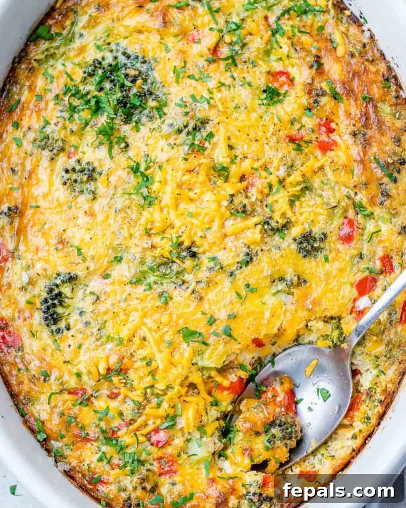 Savory Broccoli Cheddar Breakfast Bake 3 top view breakfast casserole in a white dish