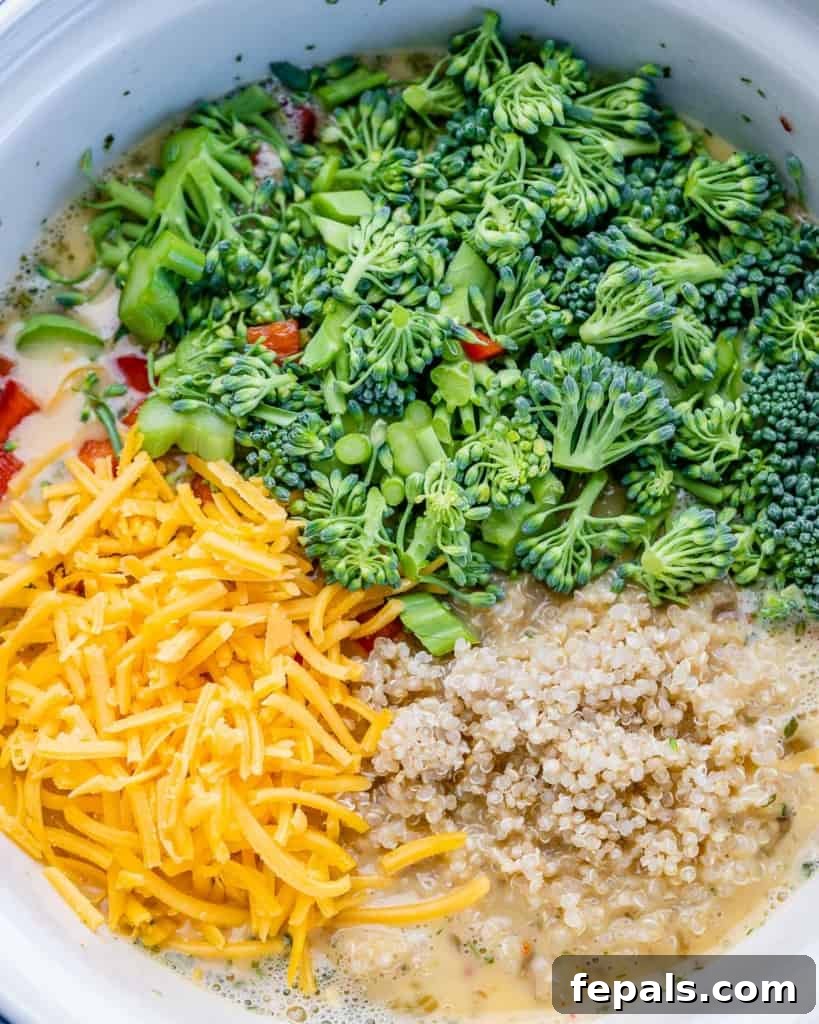 Savory Broccoli Cheddar Breakfast Bake 6 ingredients (cheese, peppers, broccoli) of casserole place in a bowl before cooking