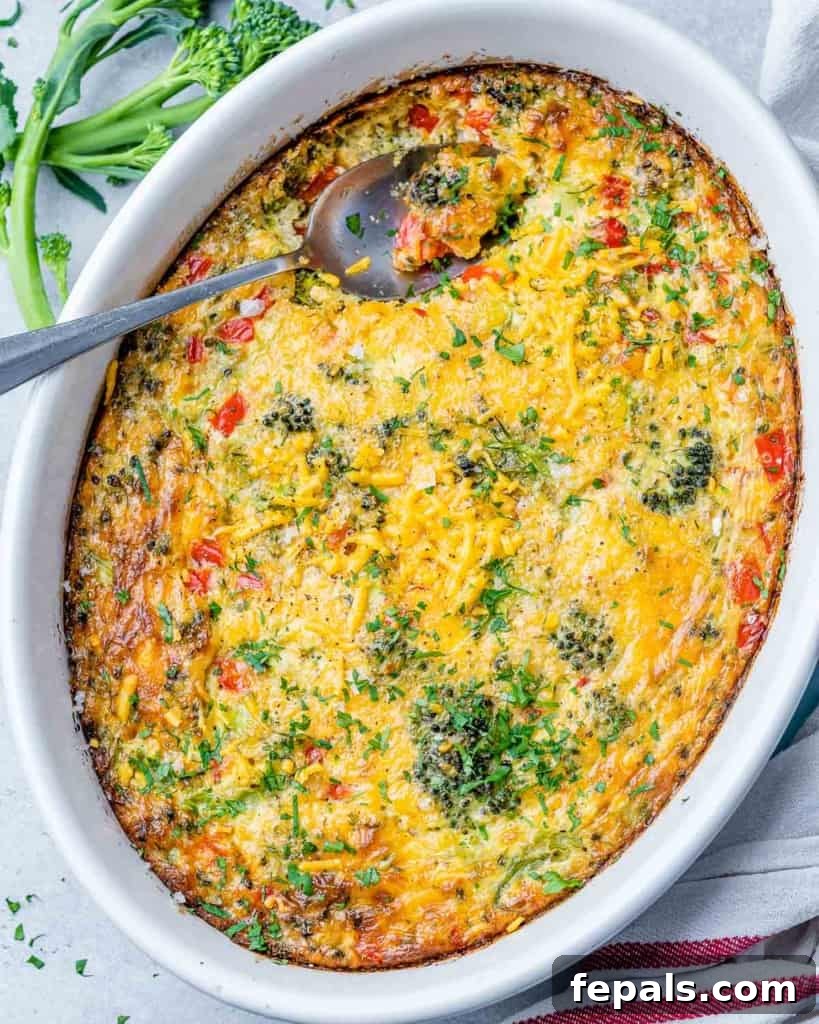 Savory Broccoli Cheddar Breakfast Bake 7 top view breakfast casserole in a white dish