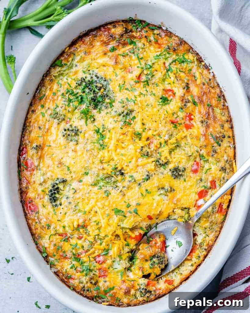 Savory Broccoli Cheddar Breakfast Bake 9 top view breakfast casserole on a white dish