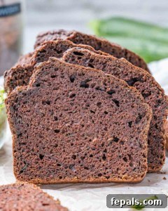 side shot of sliced zucchini bread