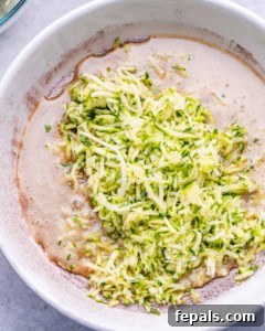 grated zucchini added over batter