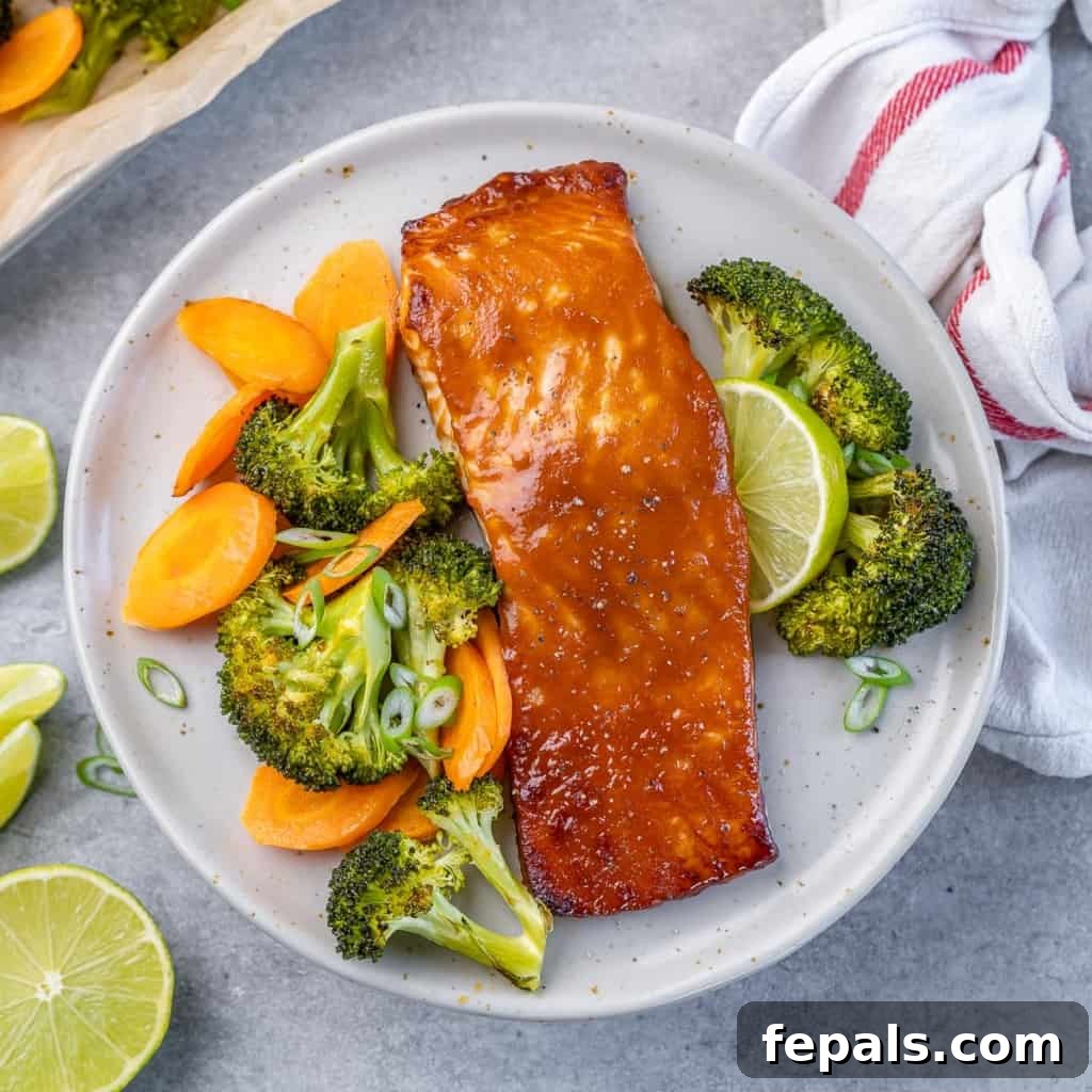 Umami Miso Salmon 2 top view of miso glazed salmon with broccoli and carrots, showcasing a healthy and vibrant meal