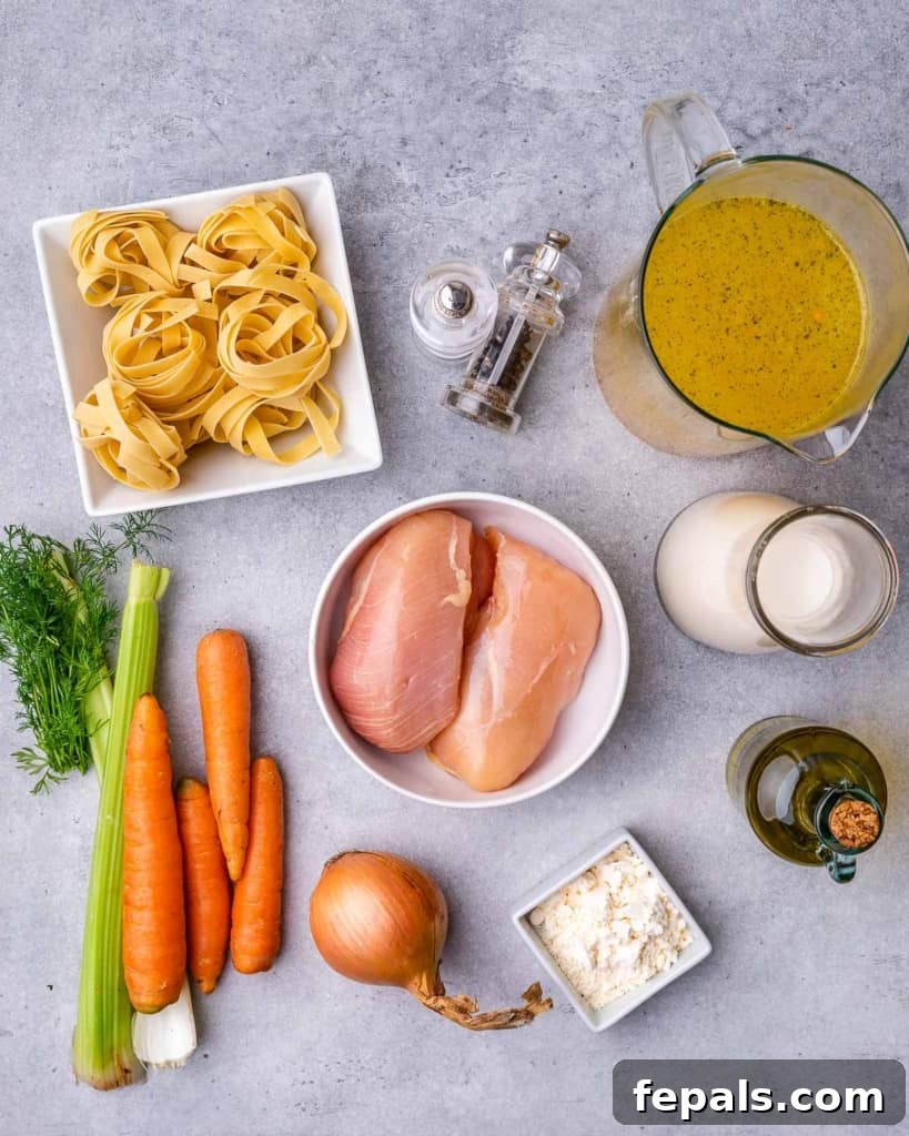 tope view of ingredients used to make the chicken noodle soup: broth, chicken breast, carrots, celery, pasta, dill, flour, milk, oil, salt and pepper