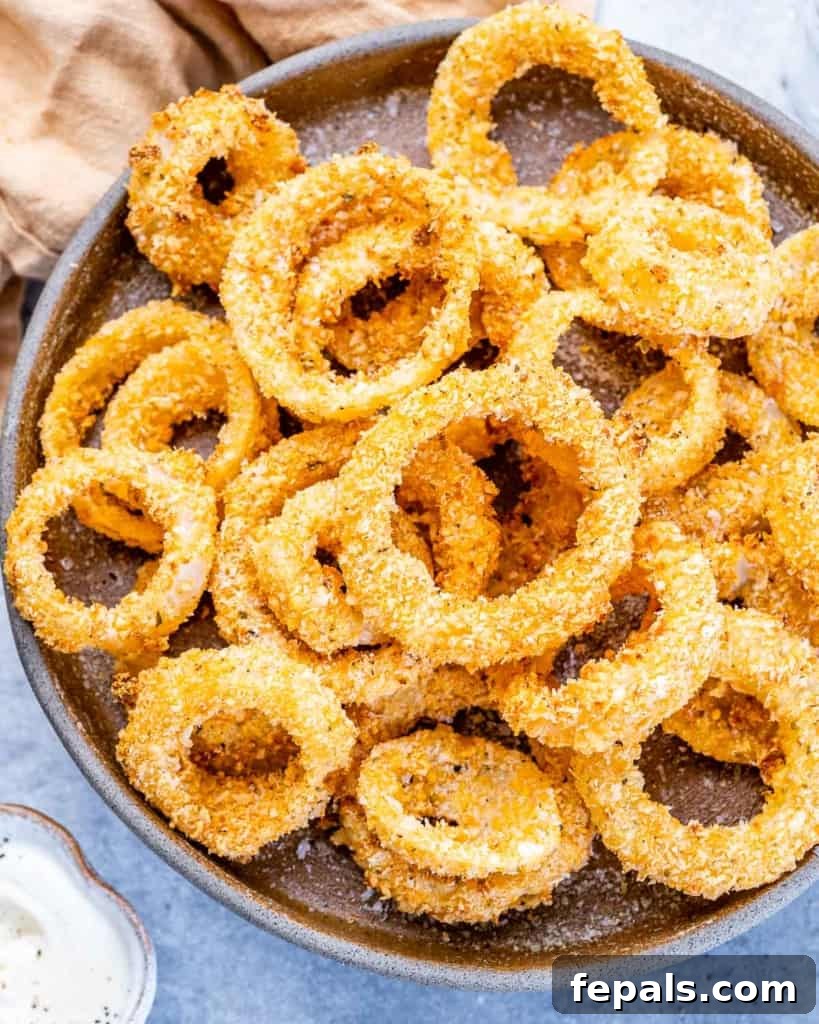 top view onion rings on a gray plate