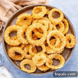 top view onion rings on a gray plate