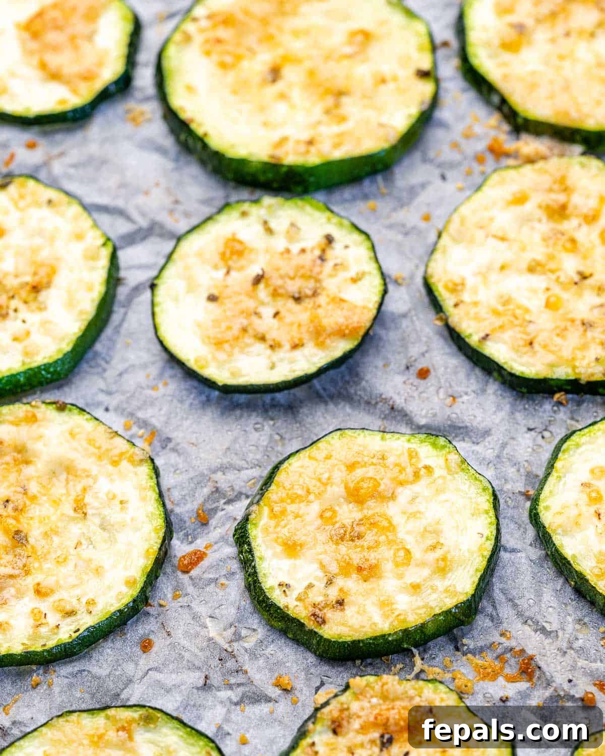 Crispy Baked Zucchini sliced bake zucchini chips with parmesan