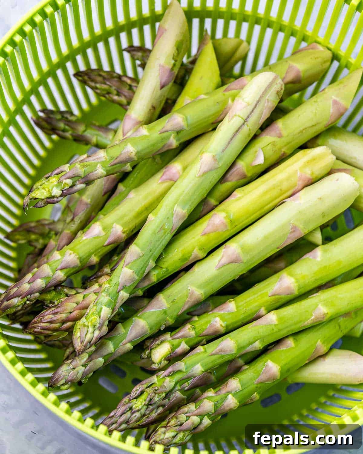 Asparagus in colander.