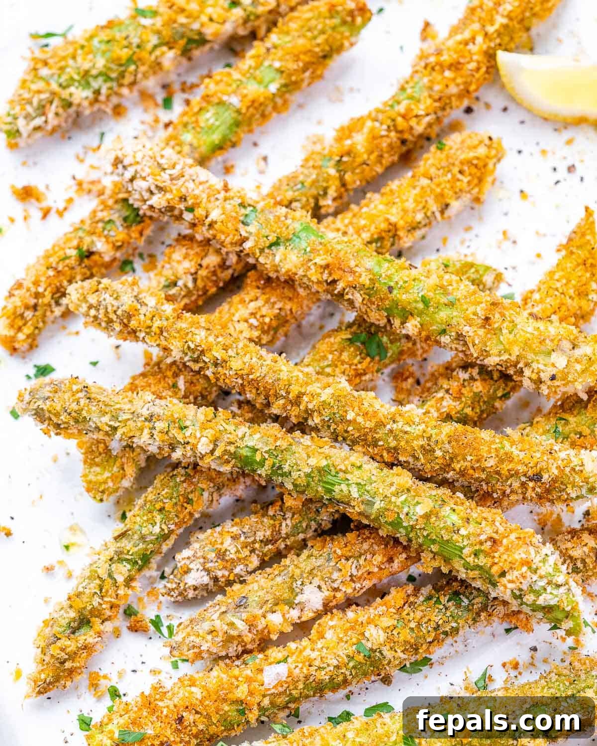 crispy oven baked asparagus on white counter