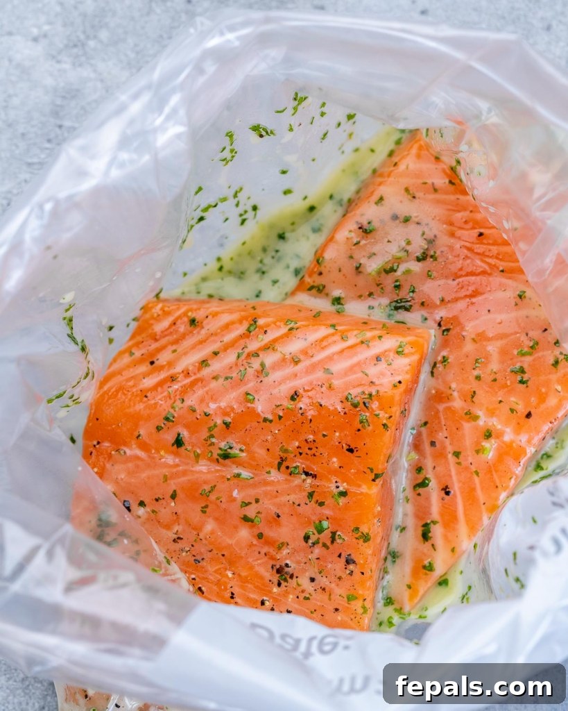 salmon filets in a ziplock bag with seasoning glaze
