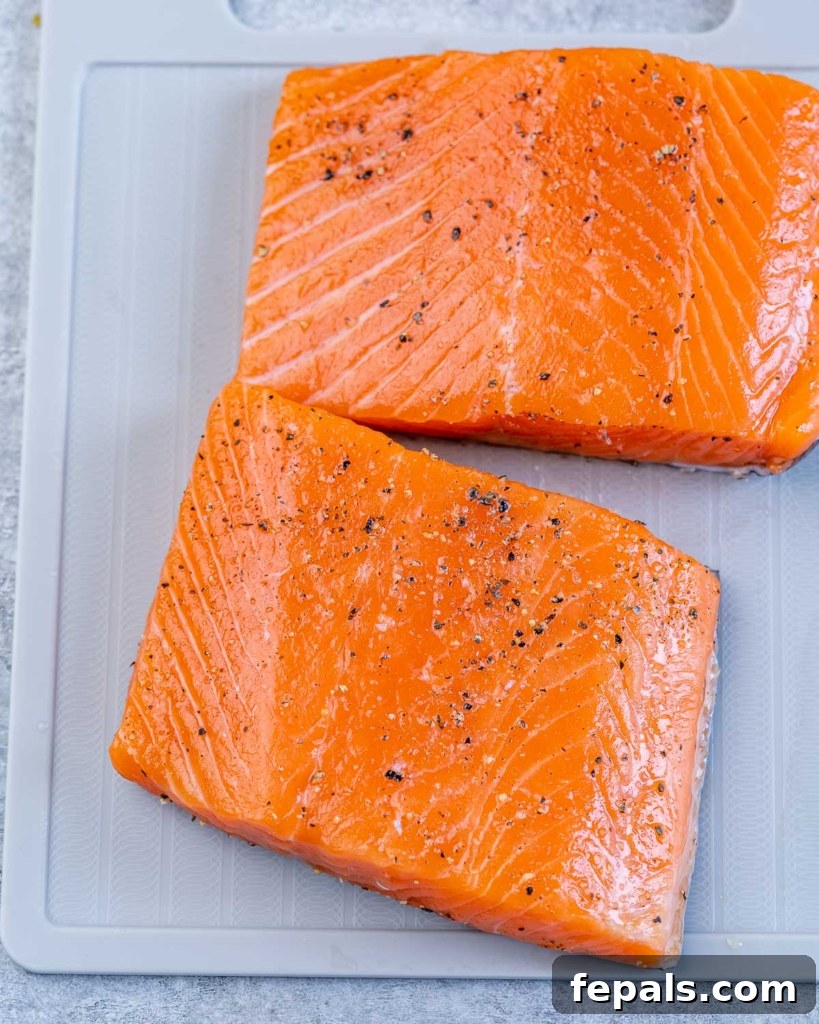 seasoned 2 salmon filets on a pan