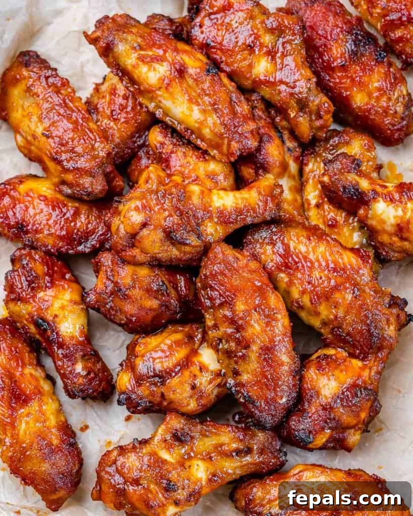 top view of chicken wings stacked over each other  