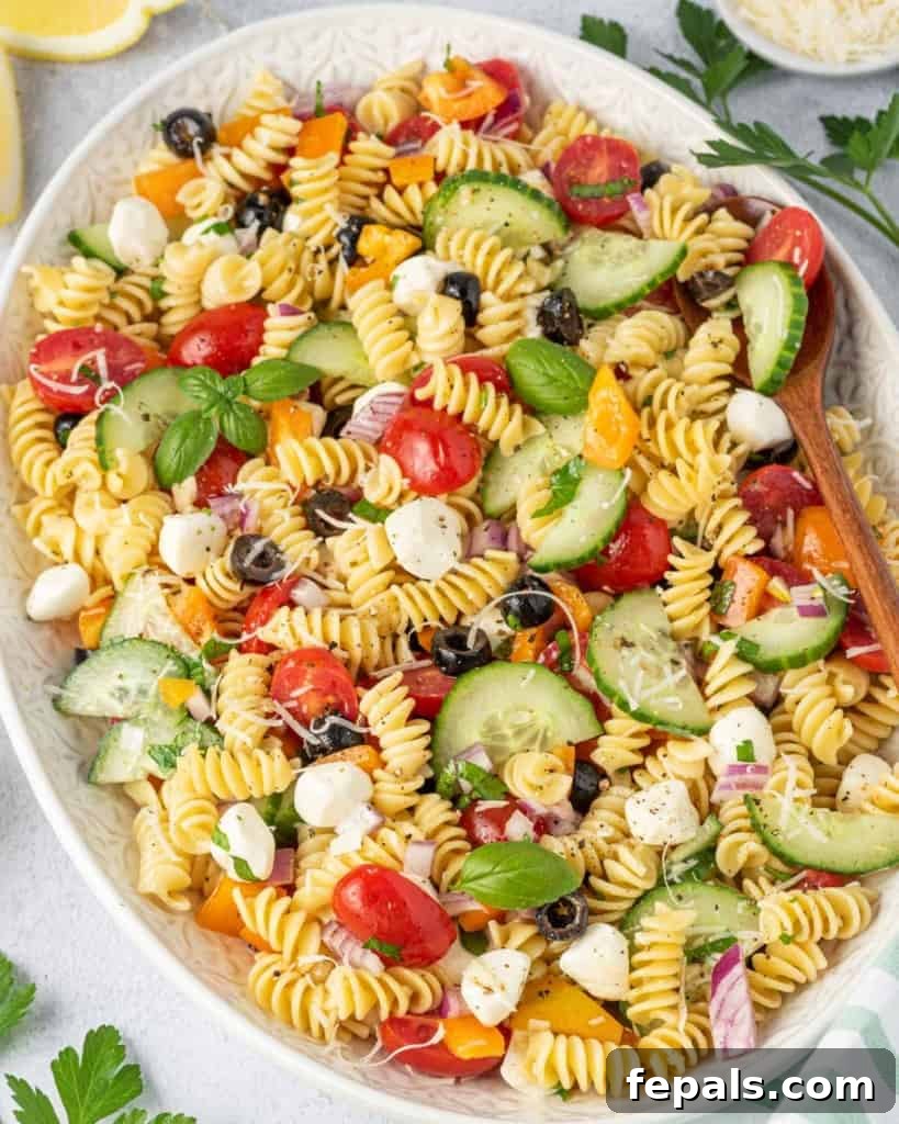 Zesty Italian Pasta Salad 3 Close-up top view of the Italian Pasta Salad, showing the texture of the pasta and fresh vegetables.