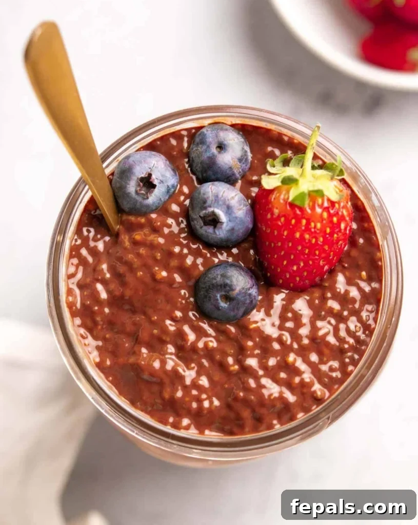 top view chia pudding in a jar topped with fruits