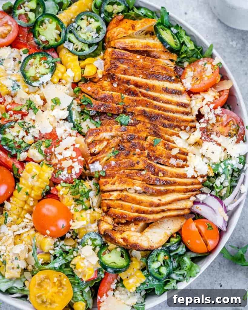 close up chicken arugula salad 