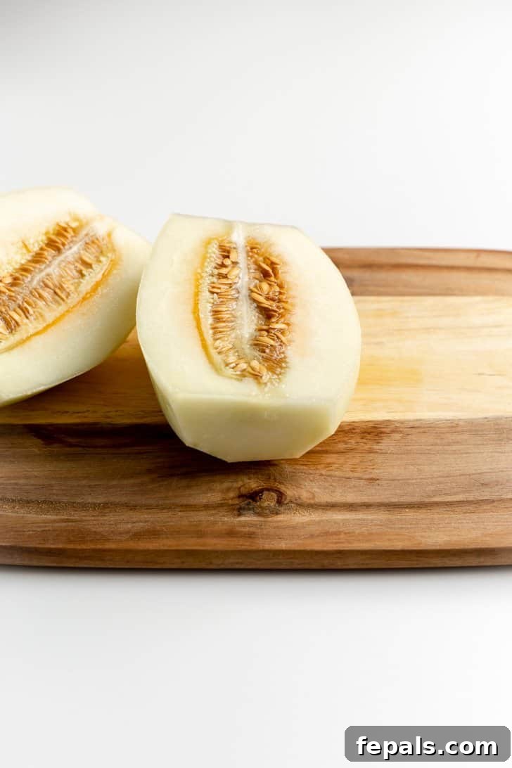 peeled cantaloupe with seeds