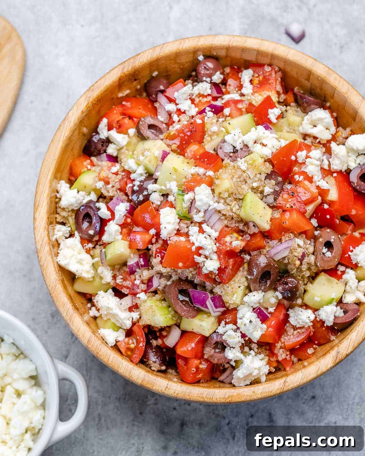 Greek Quinoa Salad Bowl Bowl of Greek quinoa salad with feta cheese, beautifully plated