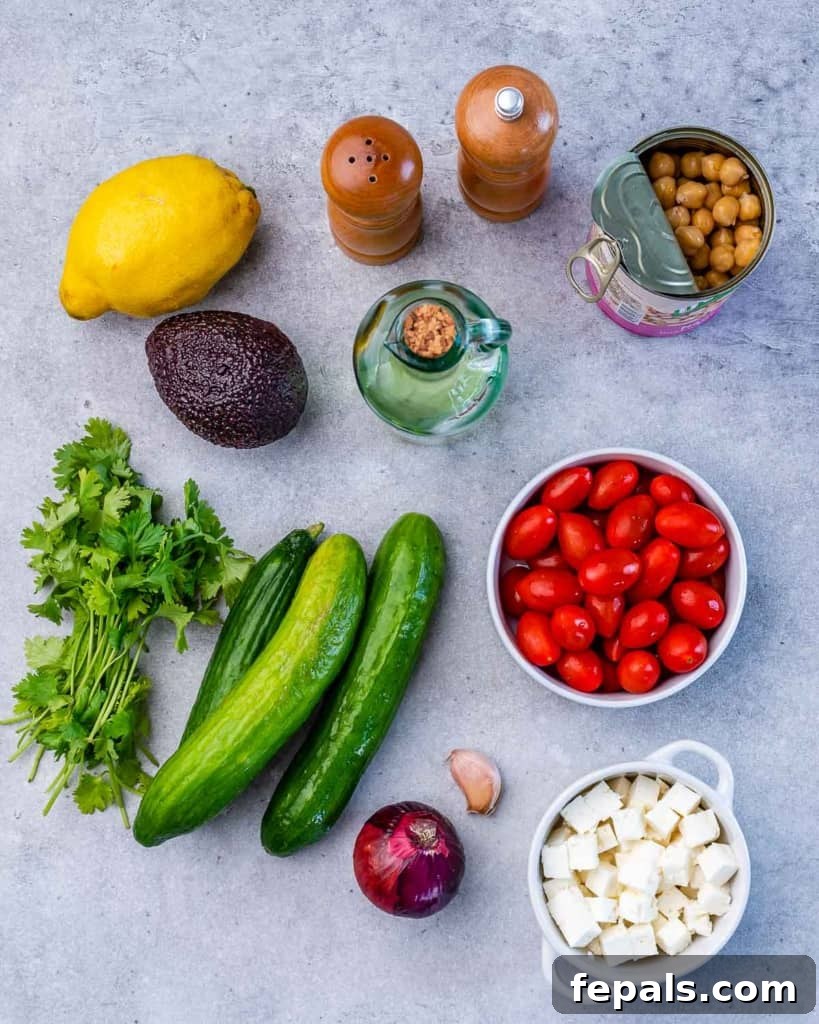 Salad ingredients on a grey table.