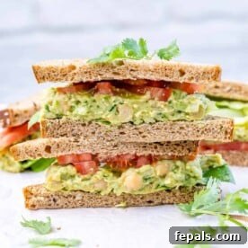 Chickpea Avocado Stack 2 side shot of chickpea and avocado sandwich stacked on each other