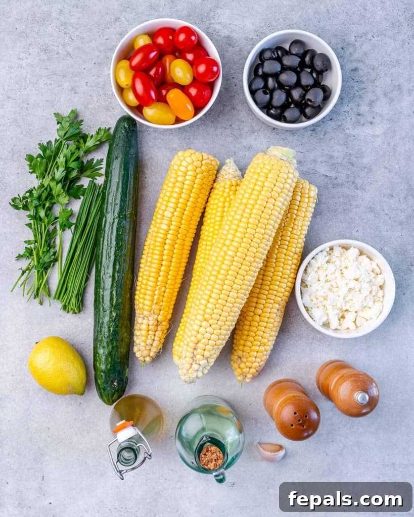 Sunshine Corn Salad 4 Overhead shot of salad ingredients on a gray table.