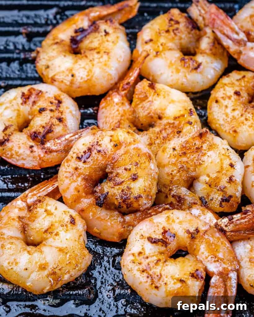 Zesty Grilled Shrimp Summer Salad 5 Shrimp on a black grill, showing a perfect char.