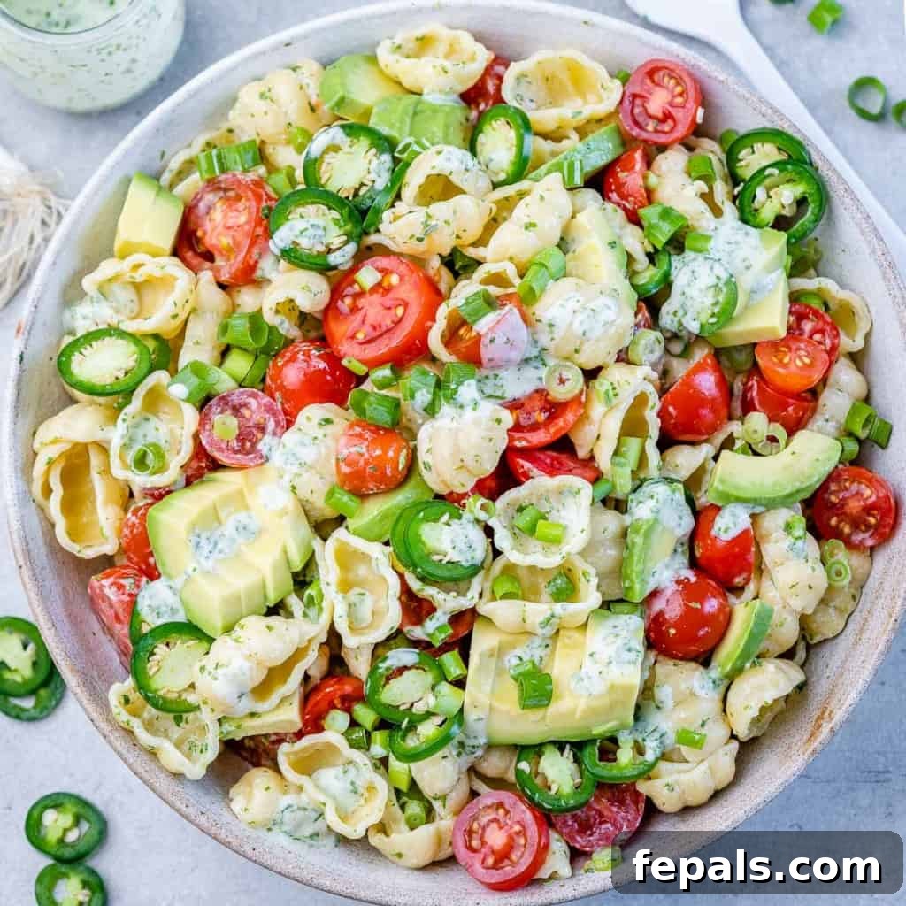 top view pasta salad in a white bowl