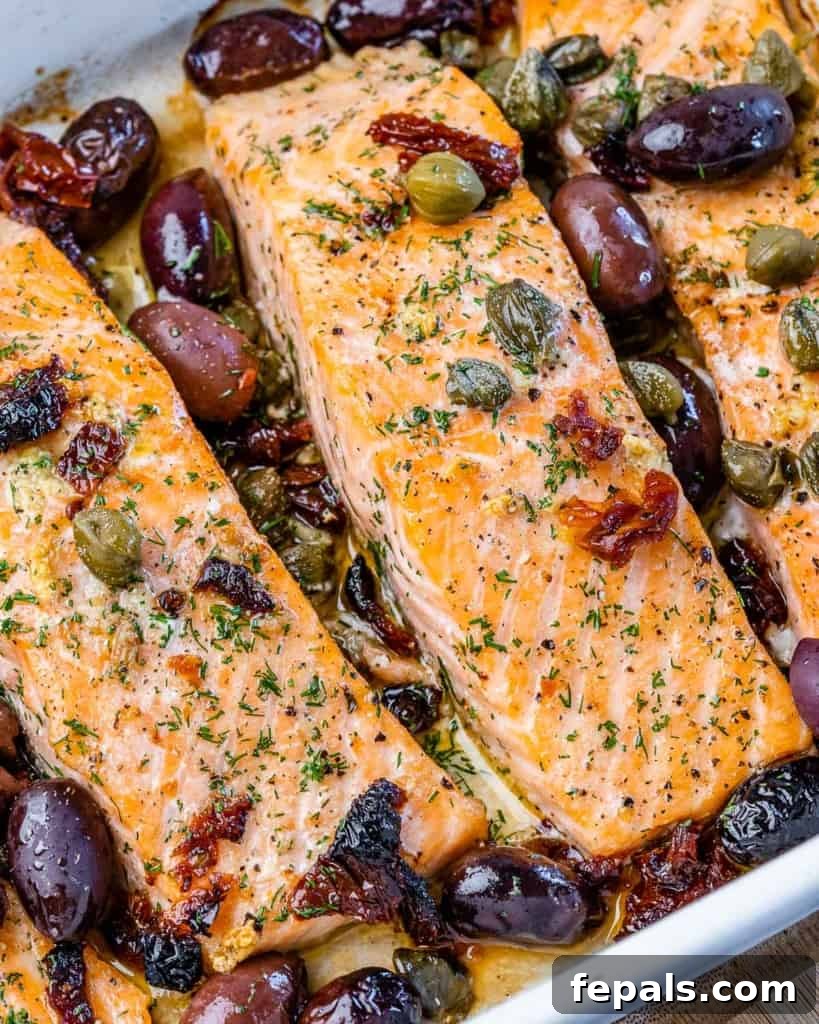Salmon fillets cooked with olives and sun-dried tomatoes.