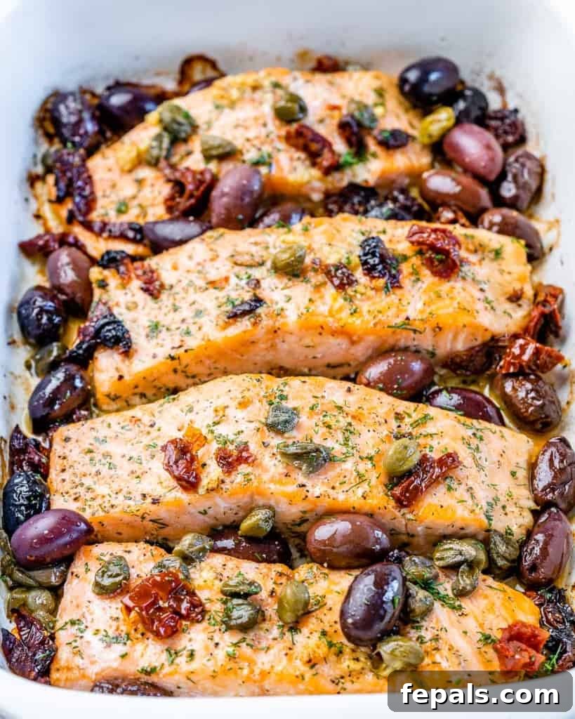 Salmon filets cooked with olives, tomatoes and capers.