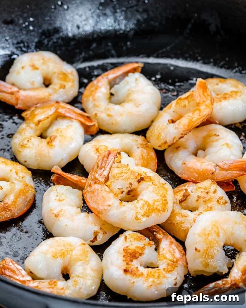 Garlic Shrimp in a Velvety Mushroom Sauce 5 Searing shrimp in a skillet.