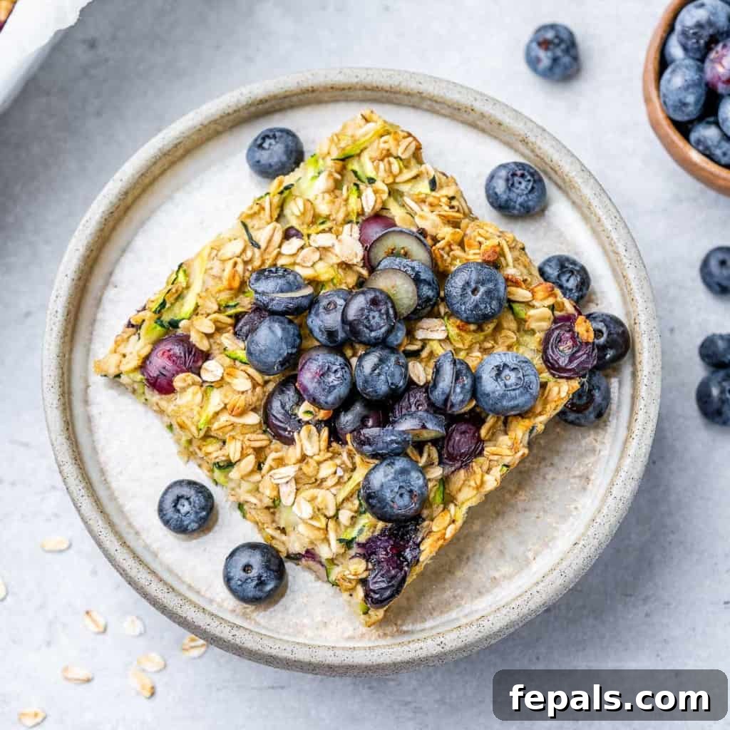top view of a serving of baked oatmeal topped with blueberries