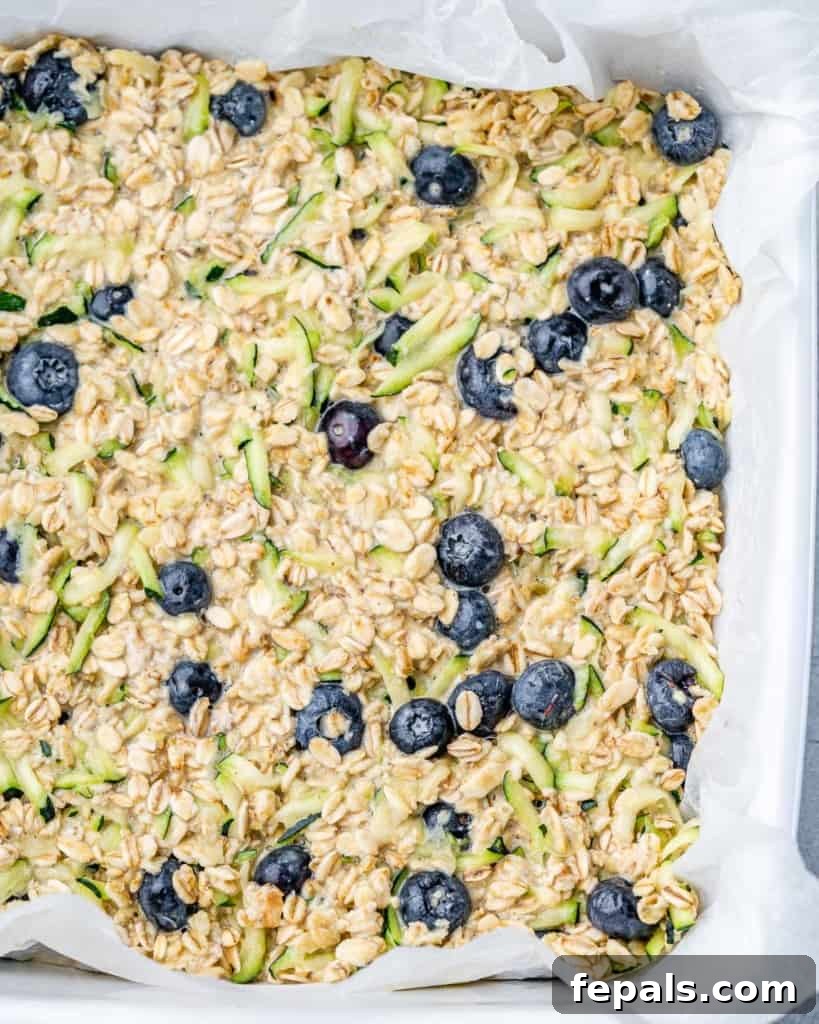Oatmeal mixture poured into a baking dish.