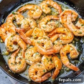 top view of sauteed shrimp scampi in a skillet