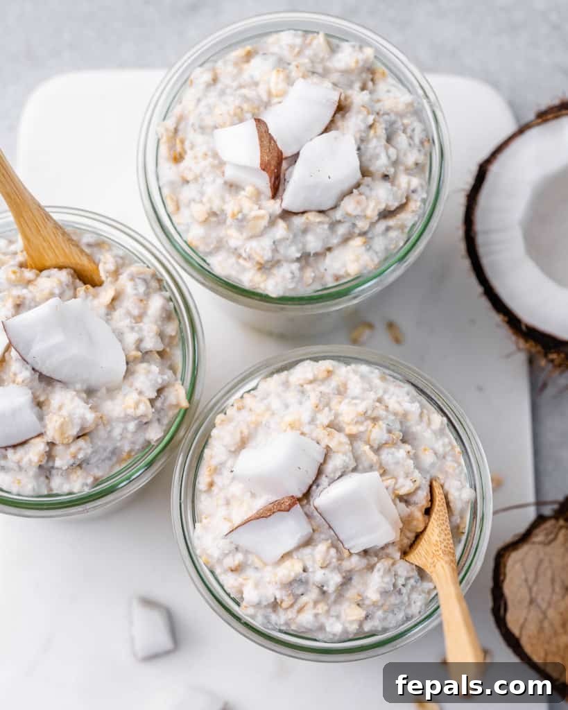 Coconut Cream Pie Dream Oats 6 Three glass jars filled with coconut cream pie overnight oats.