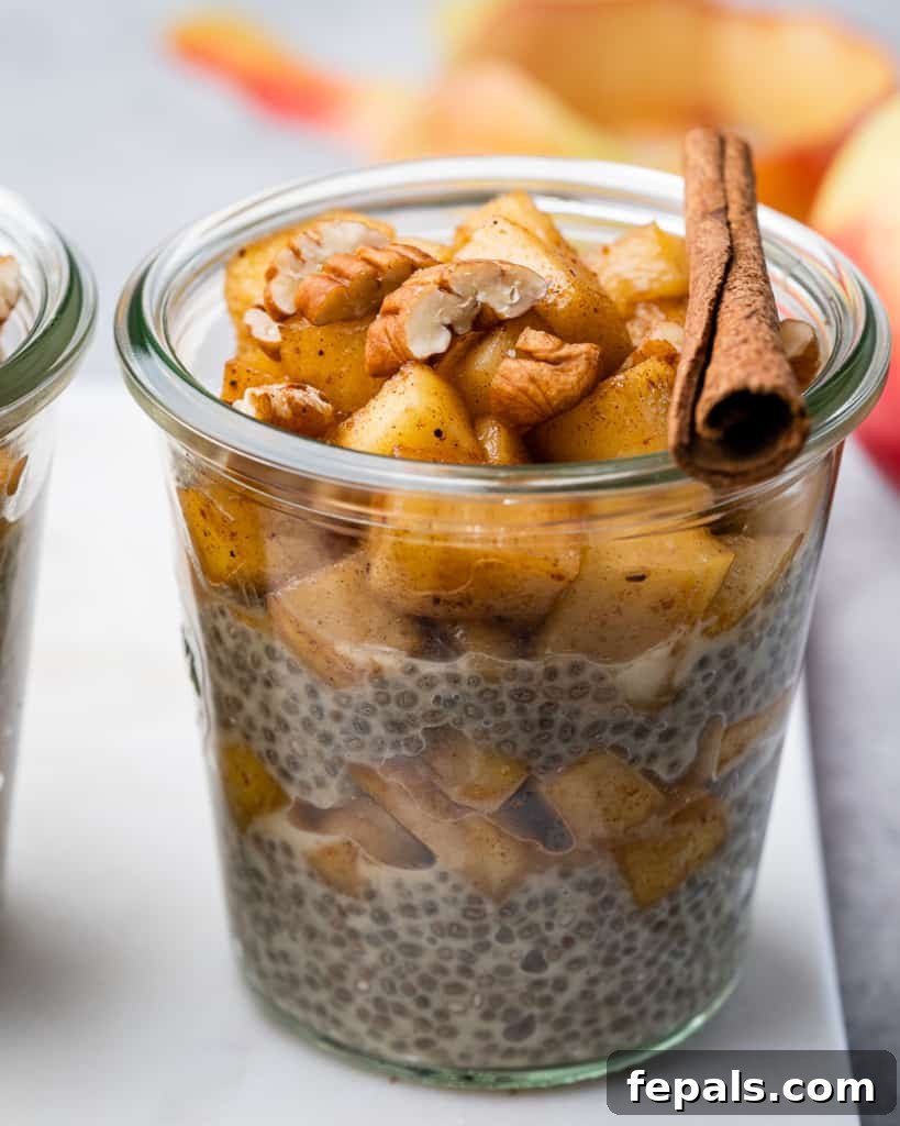 Spiced Apple Pie Chia Pudding 10 Side shot of a single chia pudding jar, showing the creamy texture and inviting layers