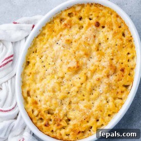 Top view of golden baked mac and cheese in a white casserole dish