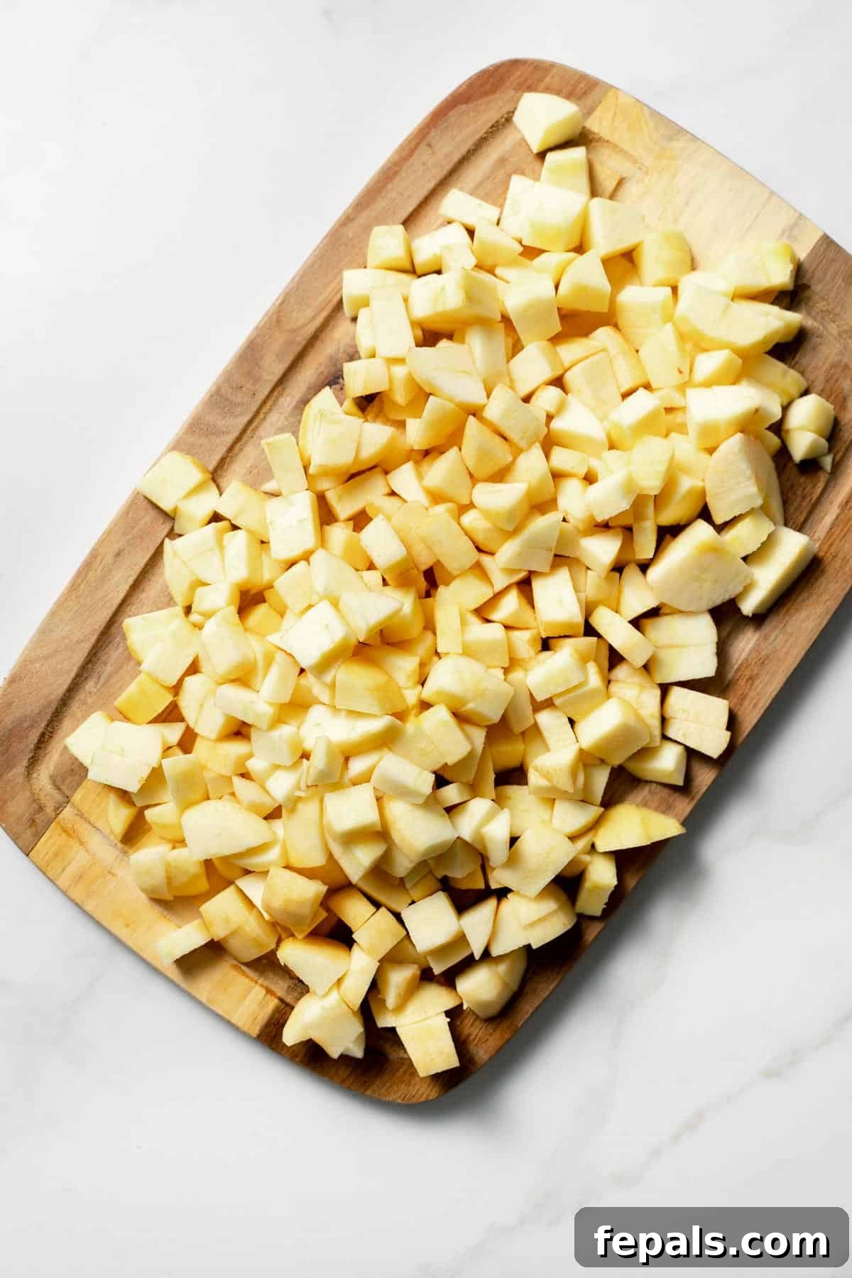 sliced apples on cutting board