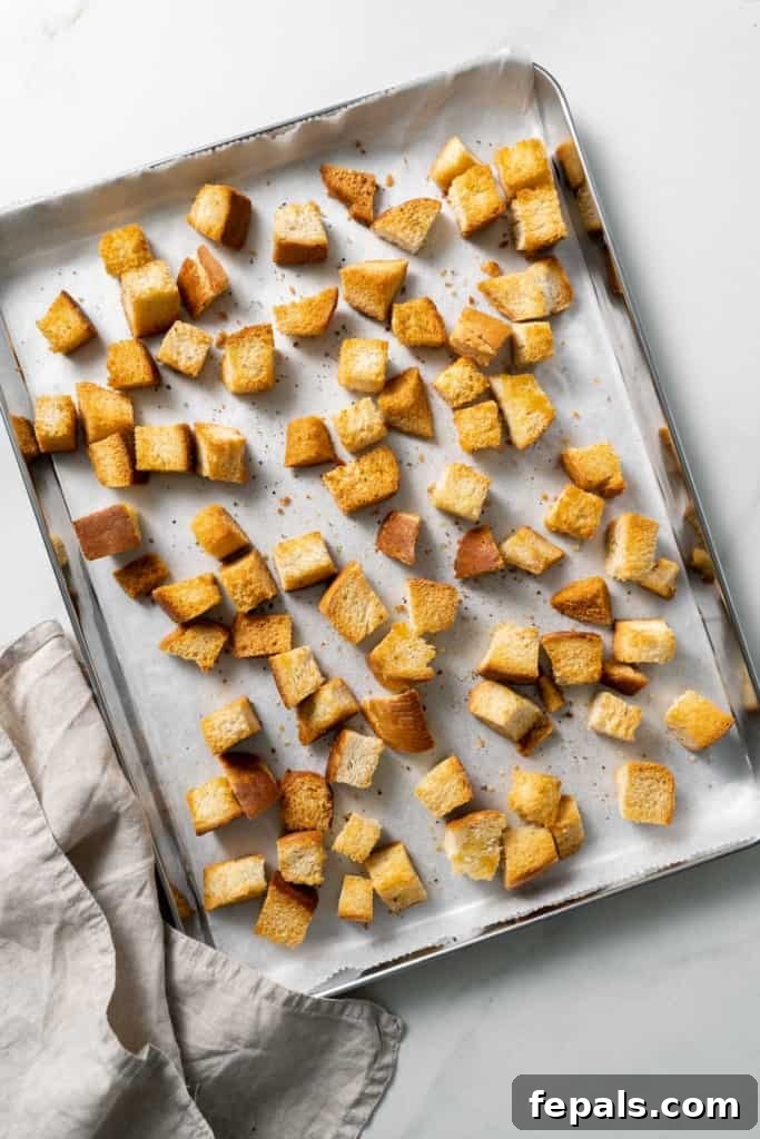 The Art of Perfect Homemade Croutons 2 one baking sheet with golden croutons