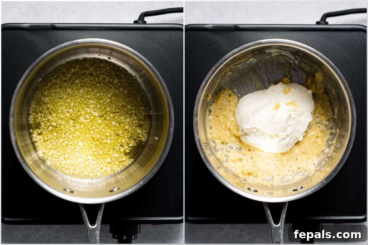 A process shot showing minced garlic simmering in olive oil in a saucepan, the first step to making healthy Alfredo sauce.
