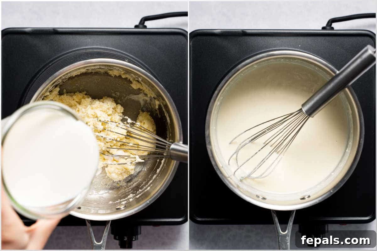 Adding light cream cheese to the saucepan with sautéed garlic and flour, melting to create the creamy base of the Alfredo sauce.