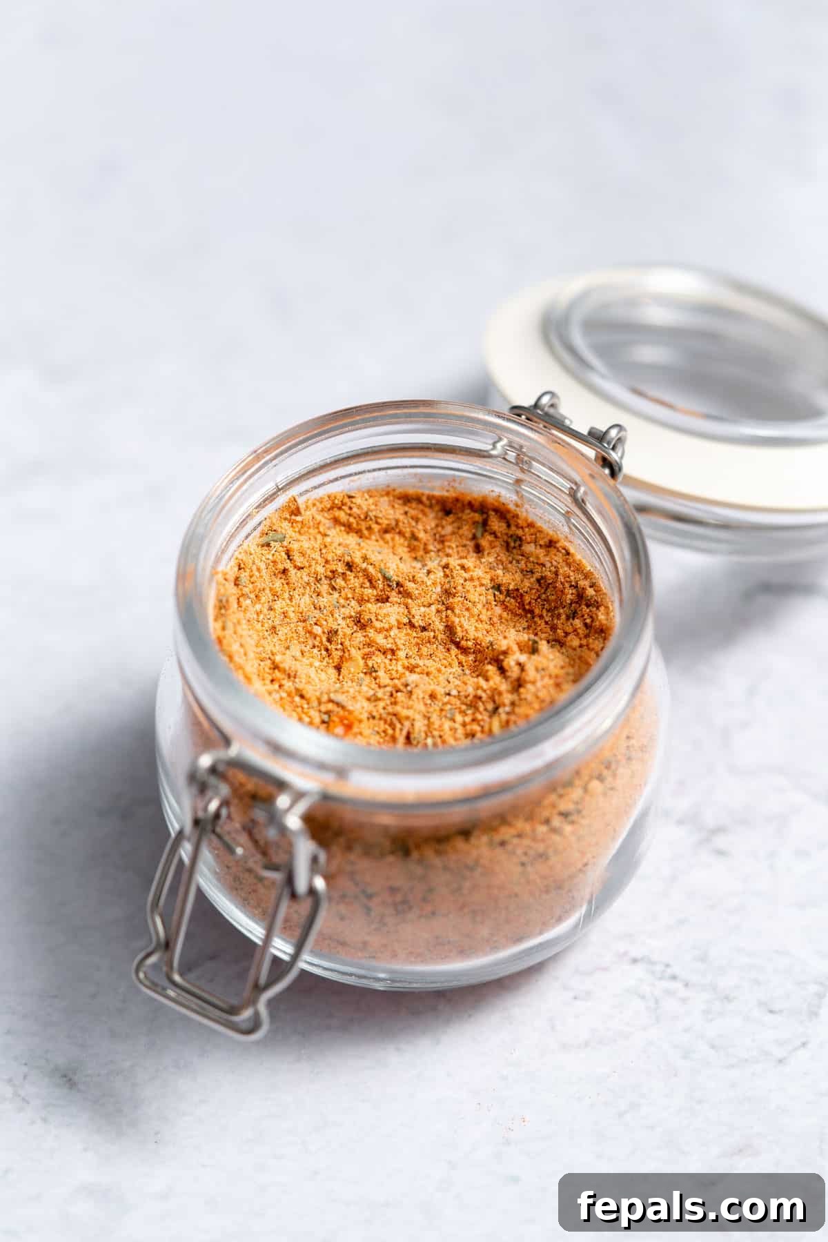 Homemade Cajun Seasoning jar filled with Cajun seasoning