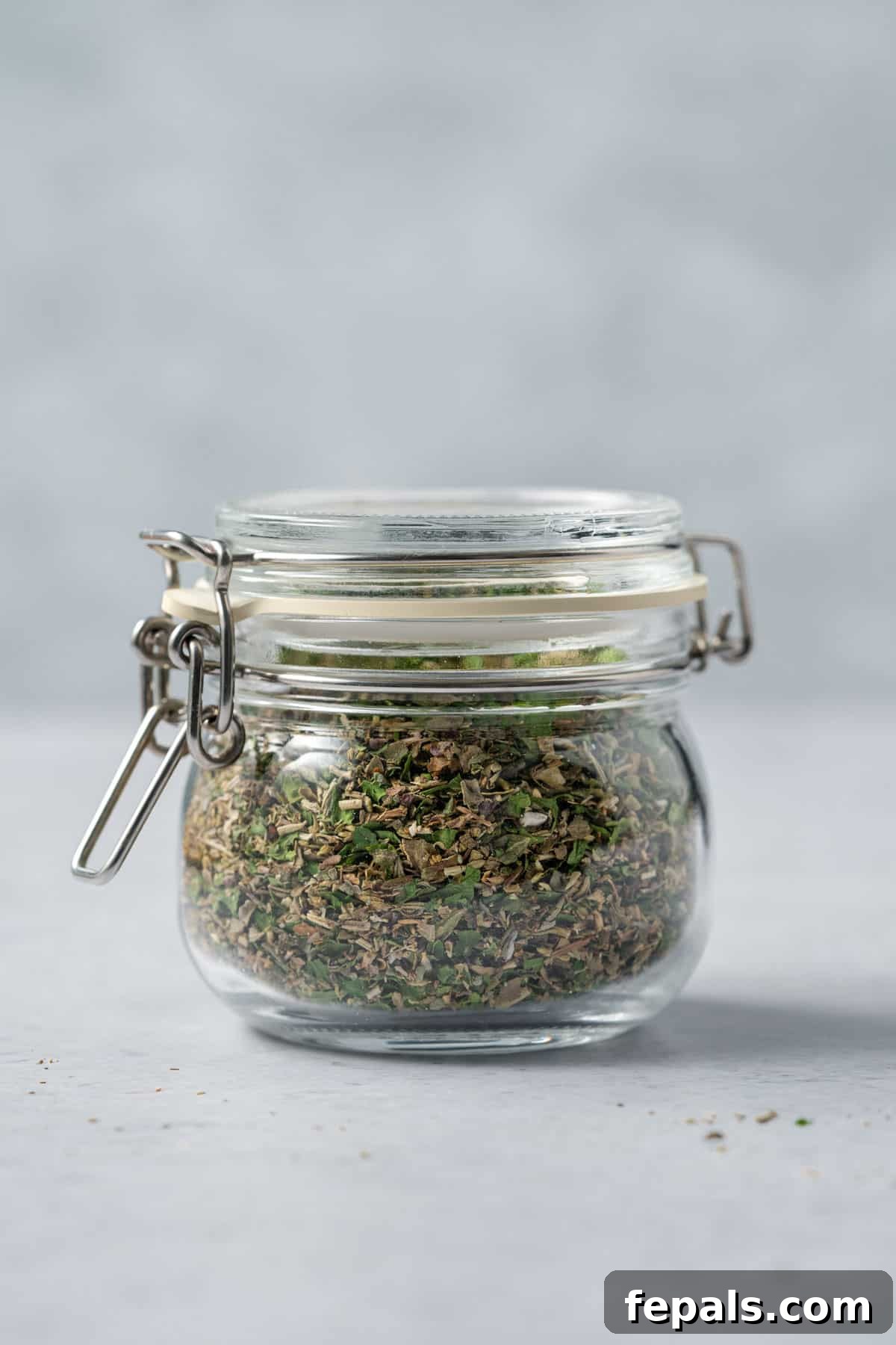 DIY Italian Seasoning Recipe jar filled with Italian seasoning