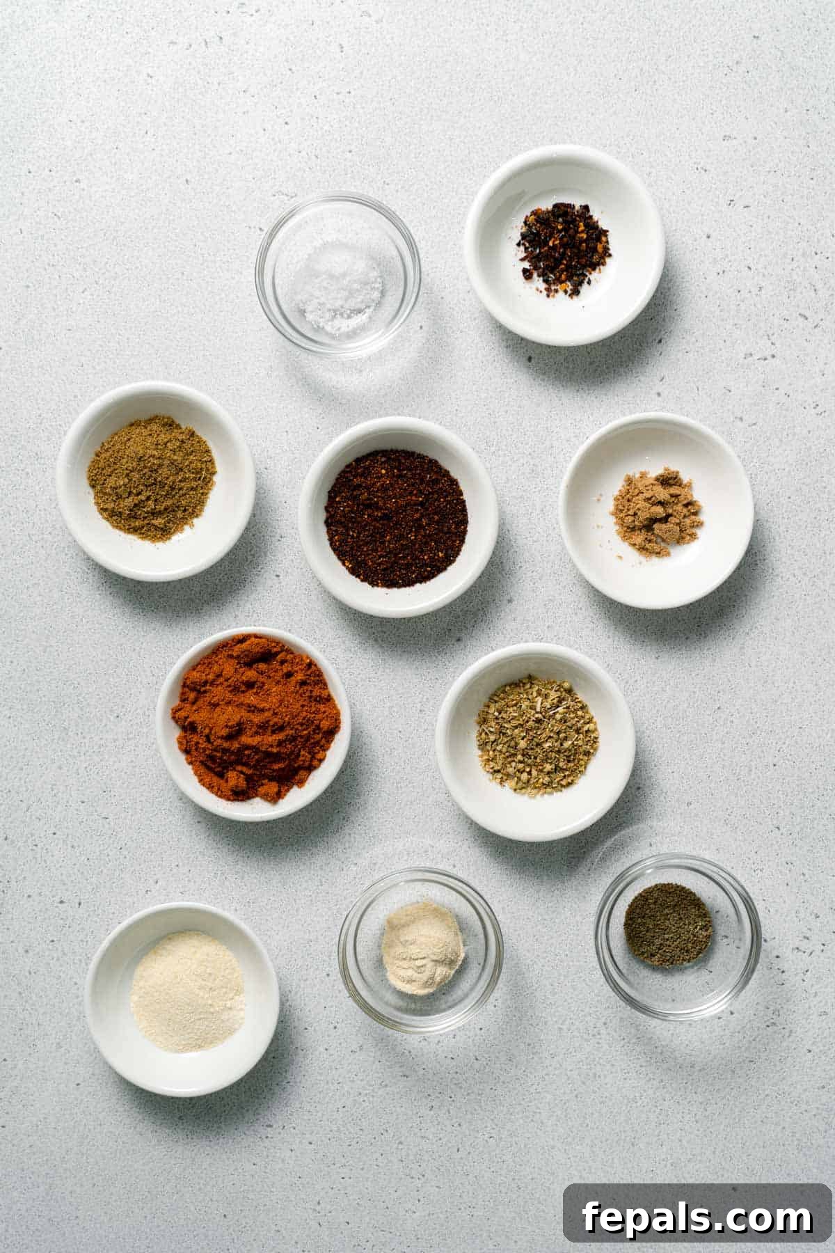 chili powder, ancho powder, cumin, oregano, garlic, onion powder, chipotle chili, coriander, celery seeds, salt