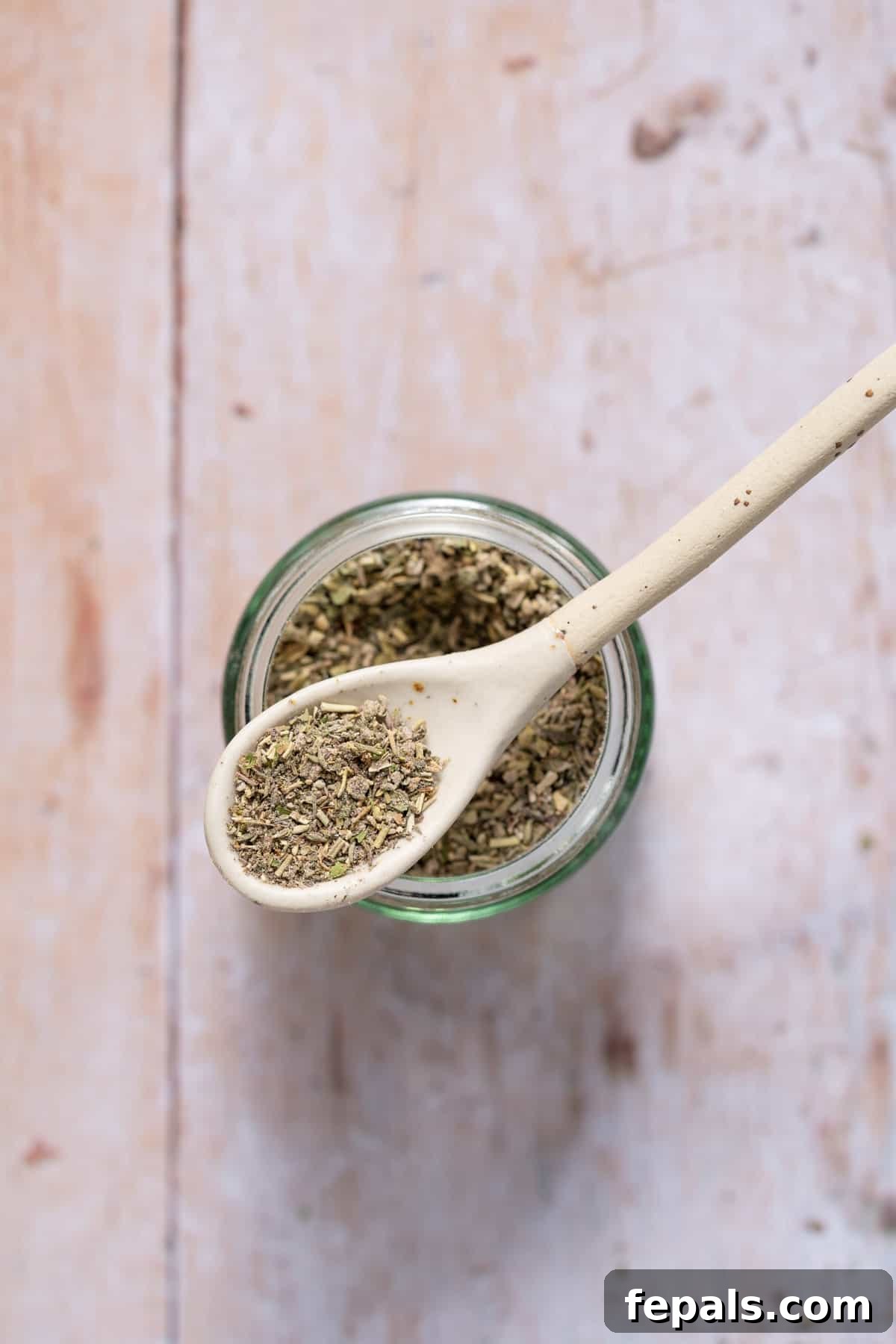 Homemade Poultry Seasoning one spoonful of dried poultry herb mix