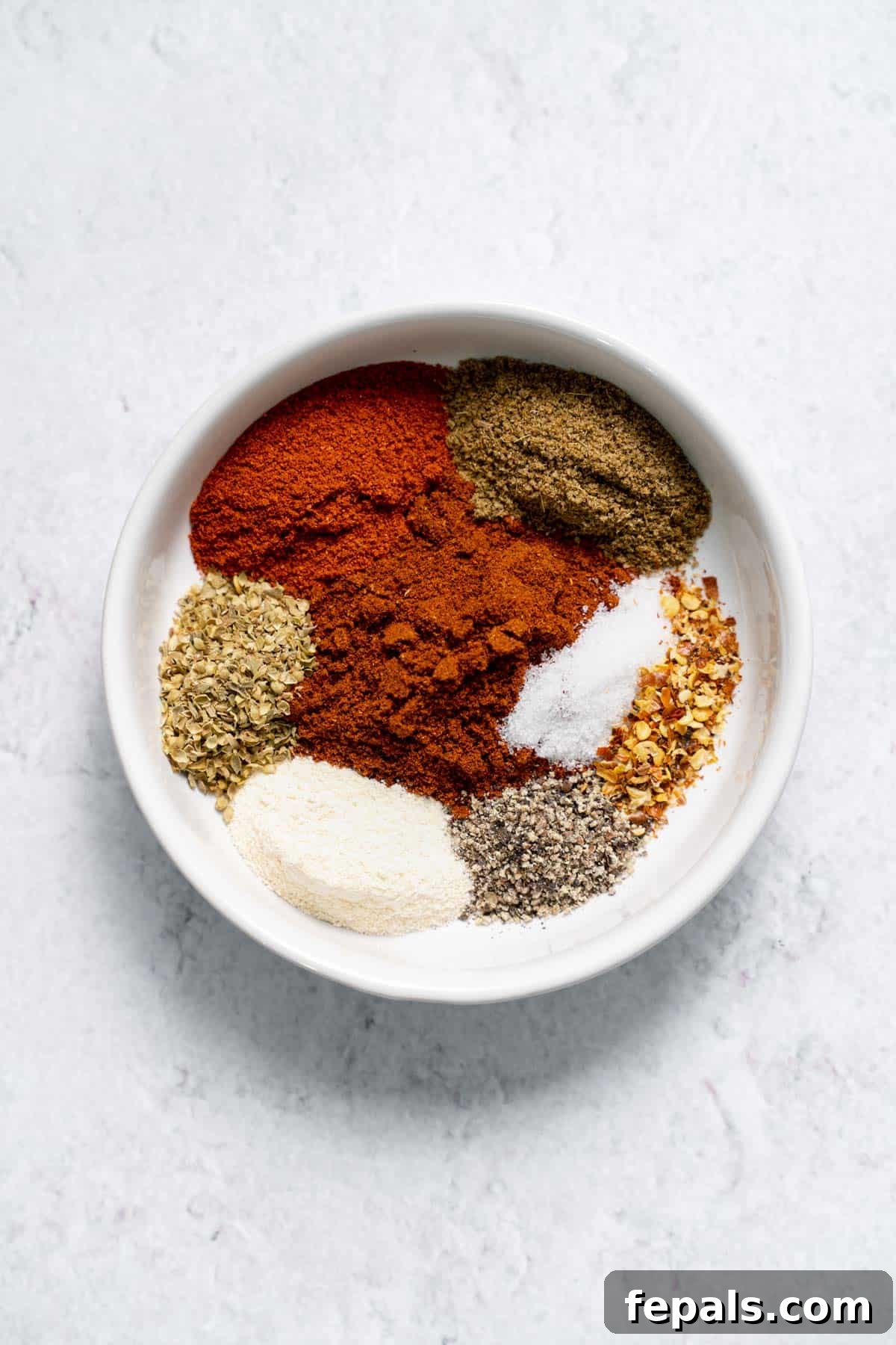 Easy Taco Seasoning mix of seasonings and spices in one bowl