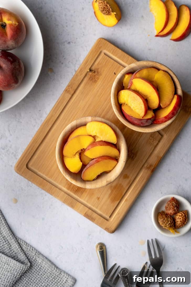Two bowls gracefully filled with fresh peach slices, presented with simple elegance, perfect for a healthy and sweet treat.