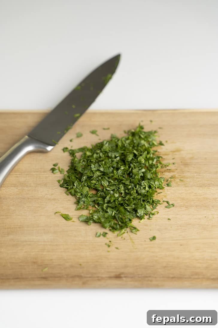 How To Cut Cilantro chopped cilantro on wooden cutting board