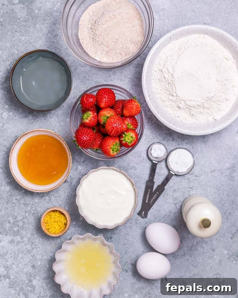 Wholesome Strawberry Muffins 4 Ingredients for baking strawberry muffins divided into small portions, neatly arranged.