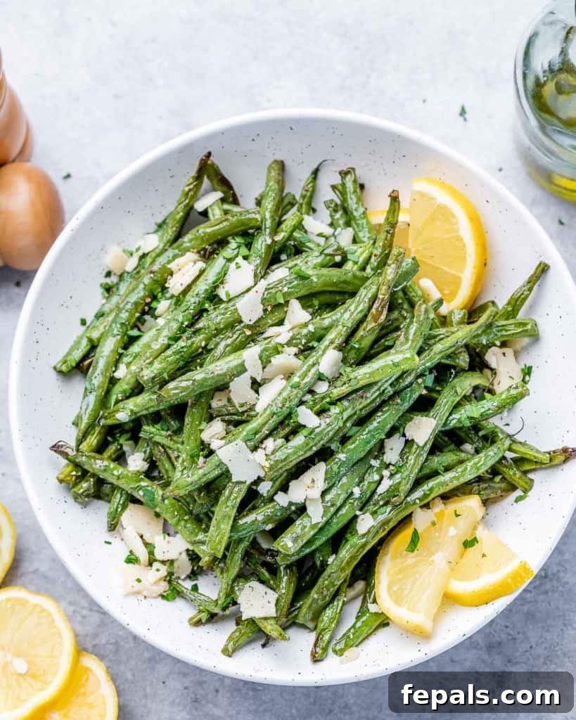 top view green beans on a round white plate 